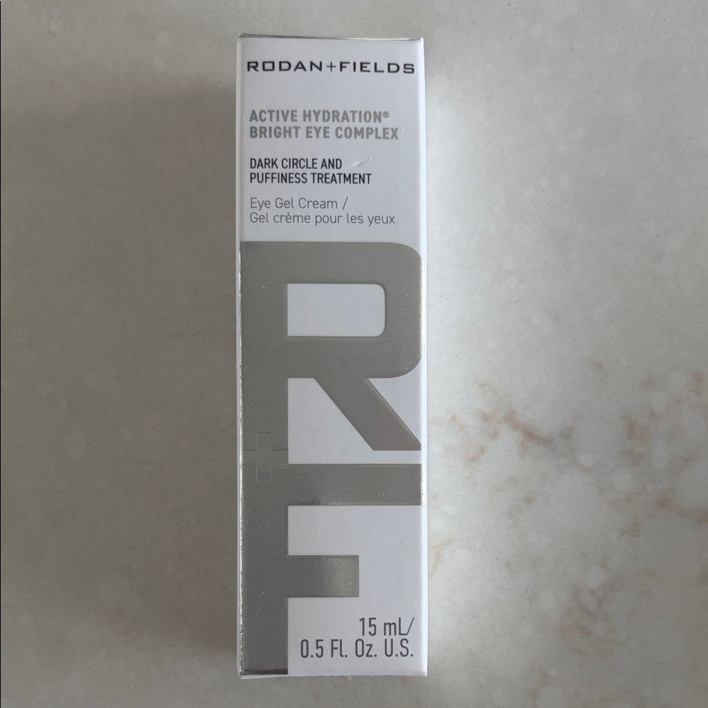 Rodan + Fields Bright Eye Complex in White and Silver Packaging